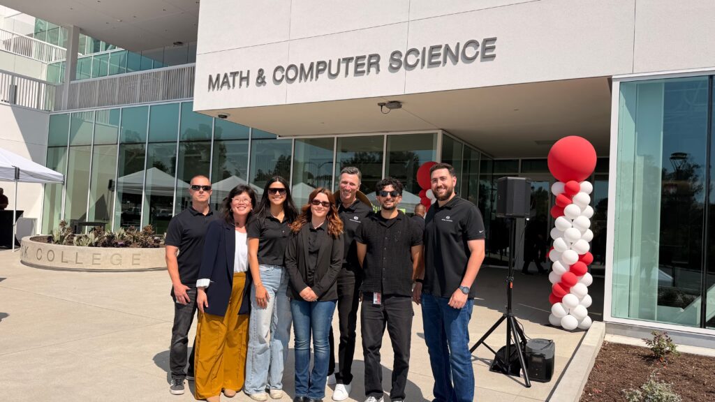 Cordoba team in front of Saddleback College's new Math and Computer Science Building at the grand opening celebration